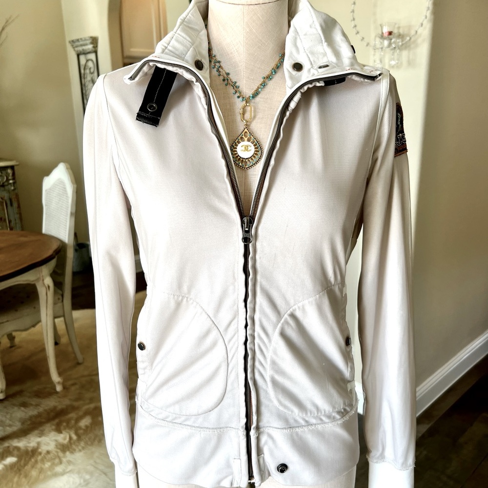 This is a women’s parajumper jacket size medium new was $300